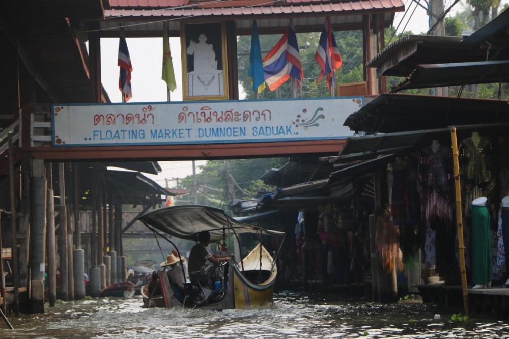 There are several floating markets near Bangkok.  This one is probably the most authentic.  Even though a lot of tourist visit here it is still the main means of income for the people that live here.  They buy and sell among themselves for daily needs.